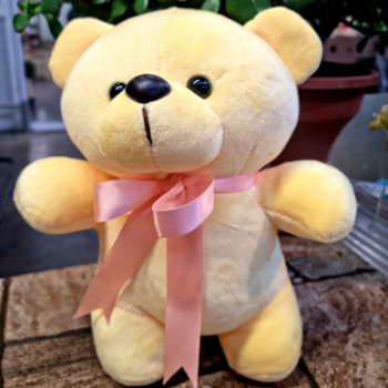 Фотография Мишка желтый с розовым бантиком 